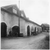 Vägstation T8, Grythyttan, filial Kopparberg. Förrådsbyggnad i äldre stenbyggnad.