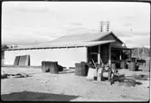 Vägstation AC14, Lycksele. Förrådsbyggnader. Upplag av diverse materiel, 