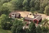 Flygfoto över fastigheter i Sävjö kommun.
