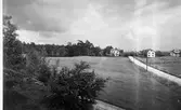 Brämhultsvägen mot öster år 1927. Östermalm i mellanplanet.
