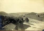 Vy över Borås nedre stationsområde med Särlabron i mittplan år 1881.