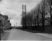 Ulricehamnsvägen mot väster. Kvarteret Ljungen t.v. år 1933.