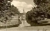 Vy tagen från Stadsparken med Gustav Adolfskyrkan i fonden år 1923.