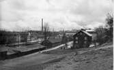 Sven Eriksonsgatan mot söder med gamla fattighuset i mellanplan i kvarteret Guldfisken år 1927.