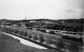 Vy från Krokshallsberget åt sydväst med Dalhem i mellanplanet t.v. och Borås-Mekaniska-Verkstad t.h. år 1927.