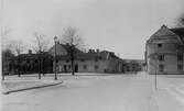 Stora Brogatan mot väster från Kungsgatan med kvarteret Tirfing t.v. år 1928.