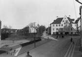 Brämhultsvägen österut från Åsbogatan med kvarteret Spoven i mellanplanet år 1922.