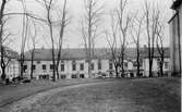 Österlånggatan från Carolikyrkan med kvarteret Charon år 1929.