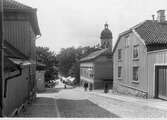 Södra Kyrkogatan, Sotarliden, västerut med kvarteret Heimdal t.h. och torghandel vid Hötorget år 1922.