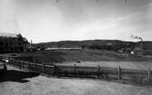 Olovsholmsområdet från kvarteret Vargens södra hörn med fabriken Norden i kvarteret Grävlingen t.h. år 1927.