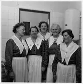 Alingsås kooperativa kvinnogillesförbund.
Några av medlemmarna i sina gillesdräkter (brun och vitrandiga) vid invigningen av konsumbutiken på Norra Strömgatan (Folkets Hus), 1959.

Gillet bildades 1933. Ombildades vid 1970-talets slut till Konsumentgillet och öppnades då också för män.
Gillets medlemmar hjälpte till med demonstrationer och konsumentupplysning i butikerna, samt bedrev kursverksamhet.