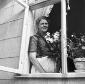 Almbyfru lämnar Oscaria. 
7 juli 1959.