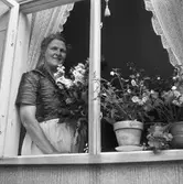 Almbyfru lämnar Oscaria. 
7 juli 1959.