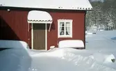 Långåker Hembygdsgård omgivet av snö, cirka 2010.