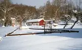 Långåker Hembygdsgård omgivet av snö, cirka 2010.