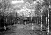 Knuttimrad stuga.
Fotografens ant: Konsulent Rystedt.