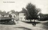 Åseda från kyrkbacken, med bl a Åsheda Nya Skoaffär m.m., 1914.