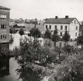 Översvämning på Linnégatan, Växjö, 1940. Man ser hus i kvarteren Mörner och Dalen.