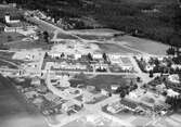 Vy över Rottne med Söraby kyrka i bakgrunden.