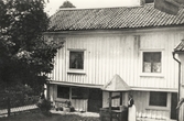 Boismanska gården, ca 1920. En kvinna, 