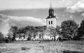 Nuvarande kyrkan i Lidhult invigdes 1880 och uppfördes enligt Johan Adolf Hawermans ritningar.
Kyrkan som är byggd i sten i historicerande blandstil, består av ett rektangulärt långhus med kor och en bakomliggande halvrund sakristia. Tornbyggnaden är försedd med en svängd huv med infällda urtavlor. Den slutna åttakantiga lanterninen avslutas med en spira som kröns av ett kors.