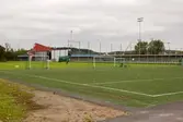 Fotbollsplaner i anslutning till Åbyvallen, som har adressen Idrottsvägen 3 i Åby, Mölndal, den 11 oktober 2016. Till höger ses även baksidan av Åbybadet. Vy mot nordväst.