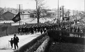 Demonstrationståget går upp på dåvarande Begslenagatan på väg mot Folkets Park, som då var nyanlagd vid en 1:a Majdemonstration år 1908.