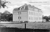 Vykort med Landsförsamlingens skola, invigd 1917, nu Afzeliiskolan.