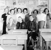 Centralskolan. 25-årsjubileum år 1953. 
Övre raden från vänster: Anna-Lisa Pettersson, Vera Stenberg, Inez Anderson, Britta Carlsson, Linnea Svensson, Alfhild Friskopp (Carlsson), Rosa Bernhardt, Sonja Anderson, Astrid Nilsson. 
Undre raden från vänster: Greta Åkerberg, Merris Sandstedt, Anna-Britta Skarin.