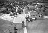 Vy över bl a den nybyggda skolan och Östra Torsås kyrka, Ingelstad.