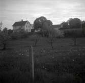 Mangårdsbyggnaden med flyglarna på Grönlid.