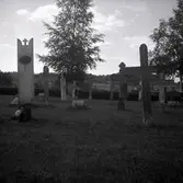 Gravvårdar av trä i Venas kyrkogård.