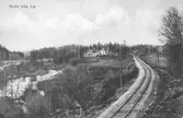 Järnvägsspår genom Lia, som fick en station när Falkenbergs Järnväg 1896 byggde sträckan Fridhemsberg-Älvsered.