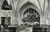 Växjö domkyrka, interiör, ca 1935. Vy mot orgelläktaren.