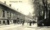 Österlånggatan från Skolgatan med kvarteret Charon ca år 1915.