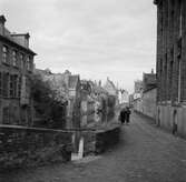 Bebyggelse vid en av kanalerna i Brygge. Tyskland-Holland-Belgien 1938.