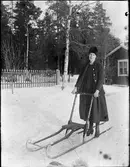 Kvinna med en spark, Börstil socken, Uppland