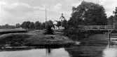 Alingsås landskyrka vid Säveån med bron som kallades 