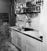 Efter brand i kök, 1962