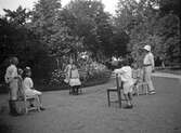 Barn leker blinkleken, 1919