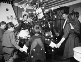 Dans kring julgranen, 1919