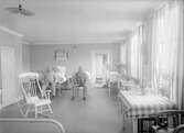 Patienter och sjuksköterska på norra sjukhemmet, 1900 ca