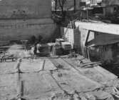 Stapling av brädor vid polishuset, 1956-03-13