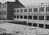 Cementgolv och cementvägg på polishuset, 1957-04-23