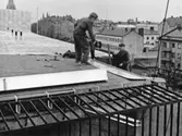 Utsikt mot nordväst när polishuset byggs, 1957-12-23