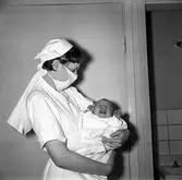 Sjuksyster med baby, 1950