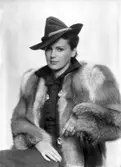 Dam i päls och hatt, 1940-tal