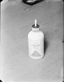 TEXTILLIM (NY FLASKA AV PLAST) SAMT LAGNING AV HÅL