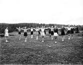 Gymnastikflickor på träningsläger, 1930-tal