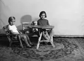 Sittande barn, 1951
